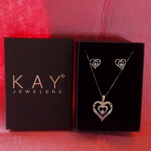 925 Sterling silver 16 inch delicate heart necklace with matching earrings.